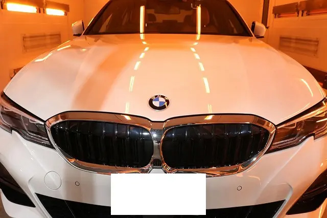 千葉県流山市　カーコーティング　BMW3　遠赤ブースにて焼き付け乾燥中の画