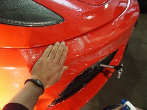 専用液剤でのフィルム張りつけ